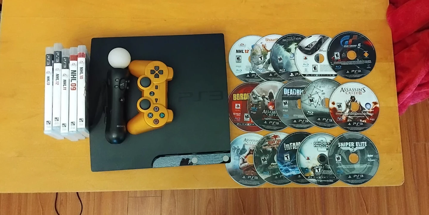 Sony PlayStation 3 Console with Games and Controllers