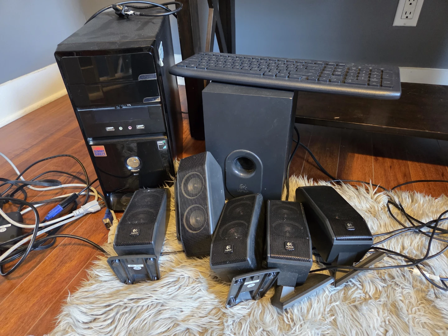 Desktop PC tower and Logitech speaker system