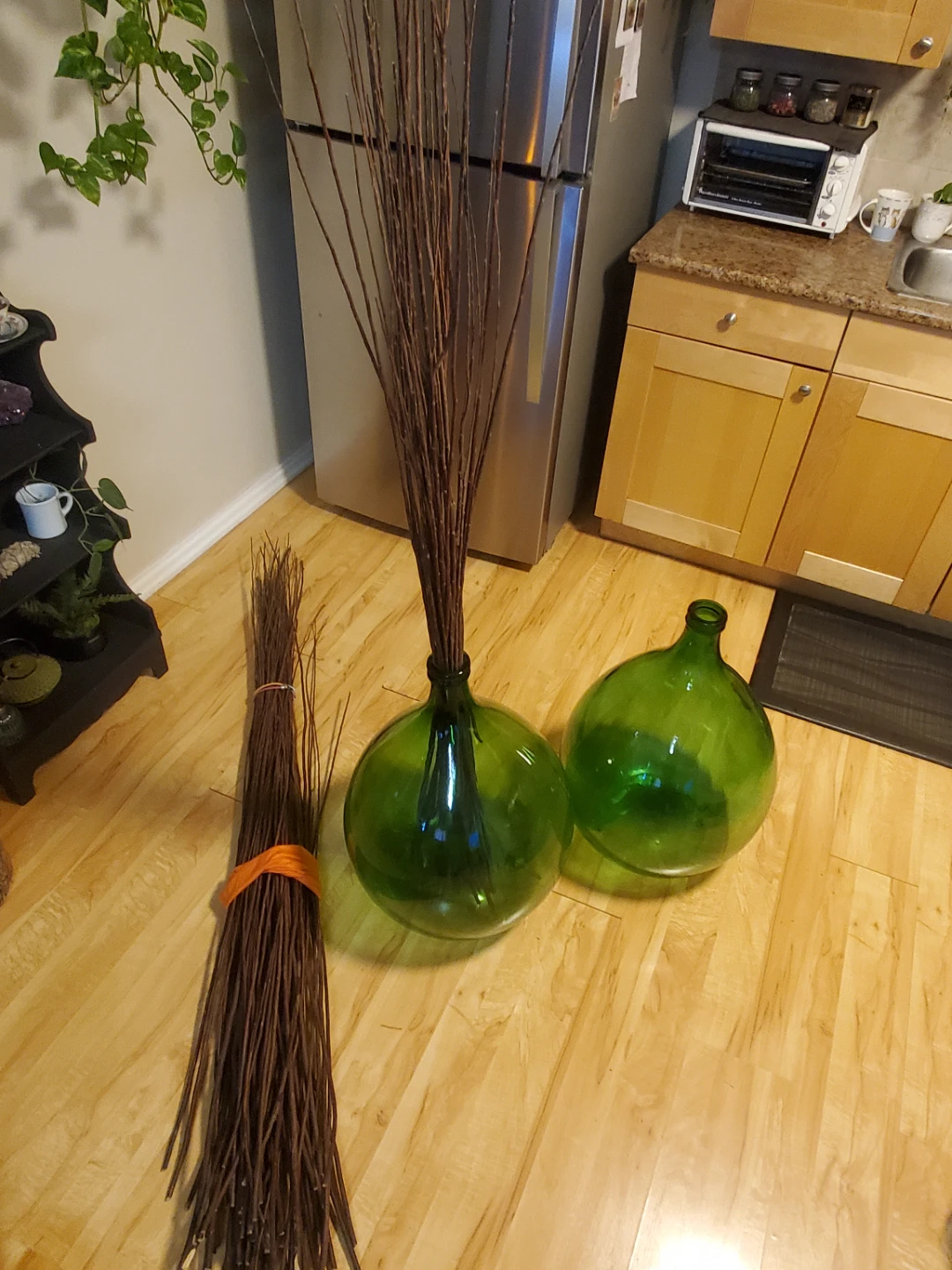 Two Vintage  Villani Green Glass Demijohns with Willow Branches