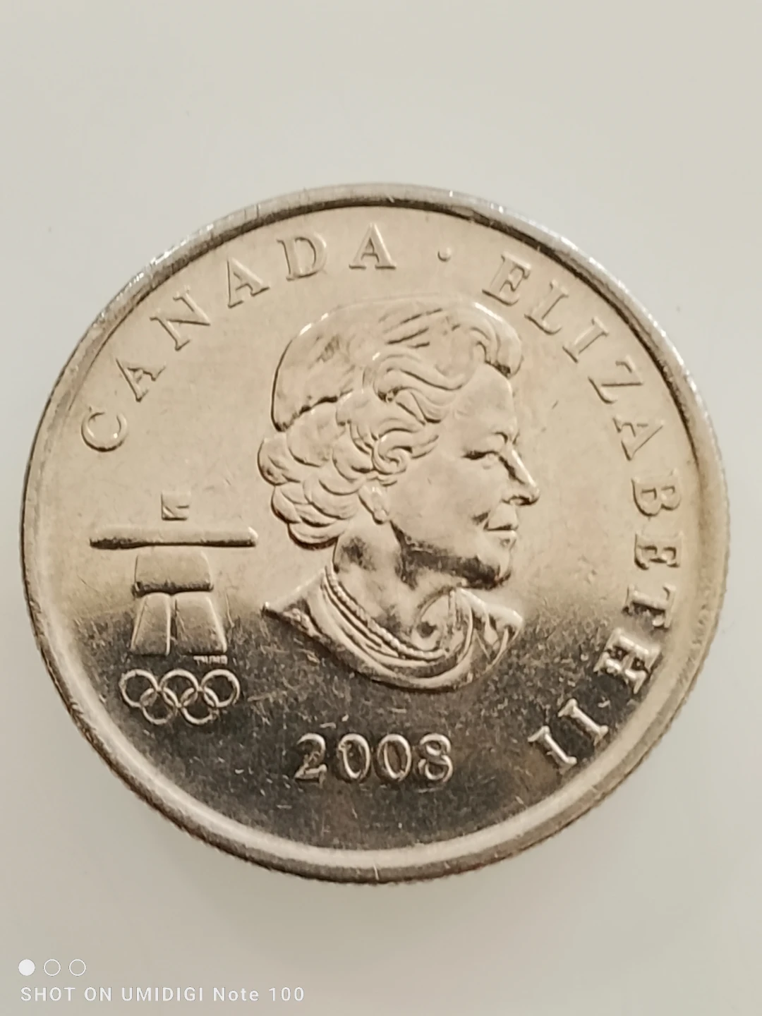 2010 Vancouver Olympic Bobsleigh 25 Cent Coin - photo 2