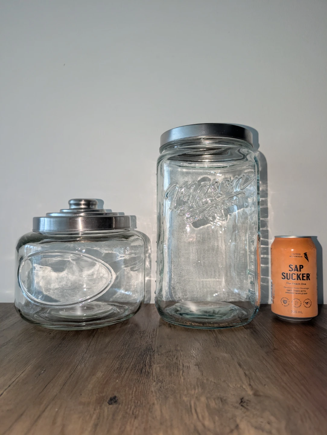 Two Glass Storage Jars with Metal Lids