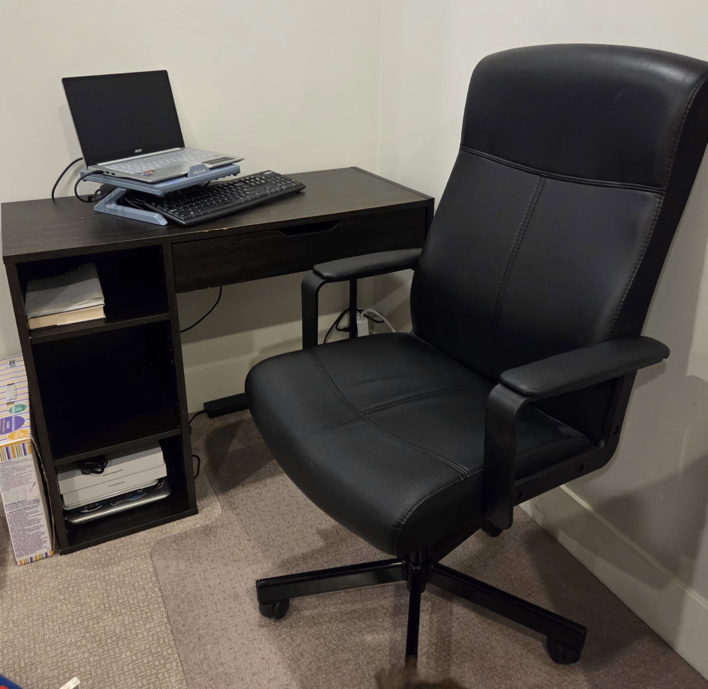 Dark wood computer desk with storage and chair