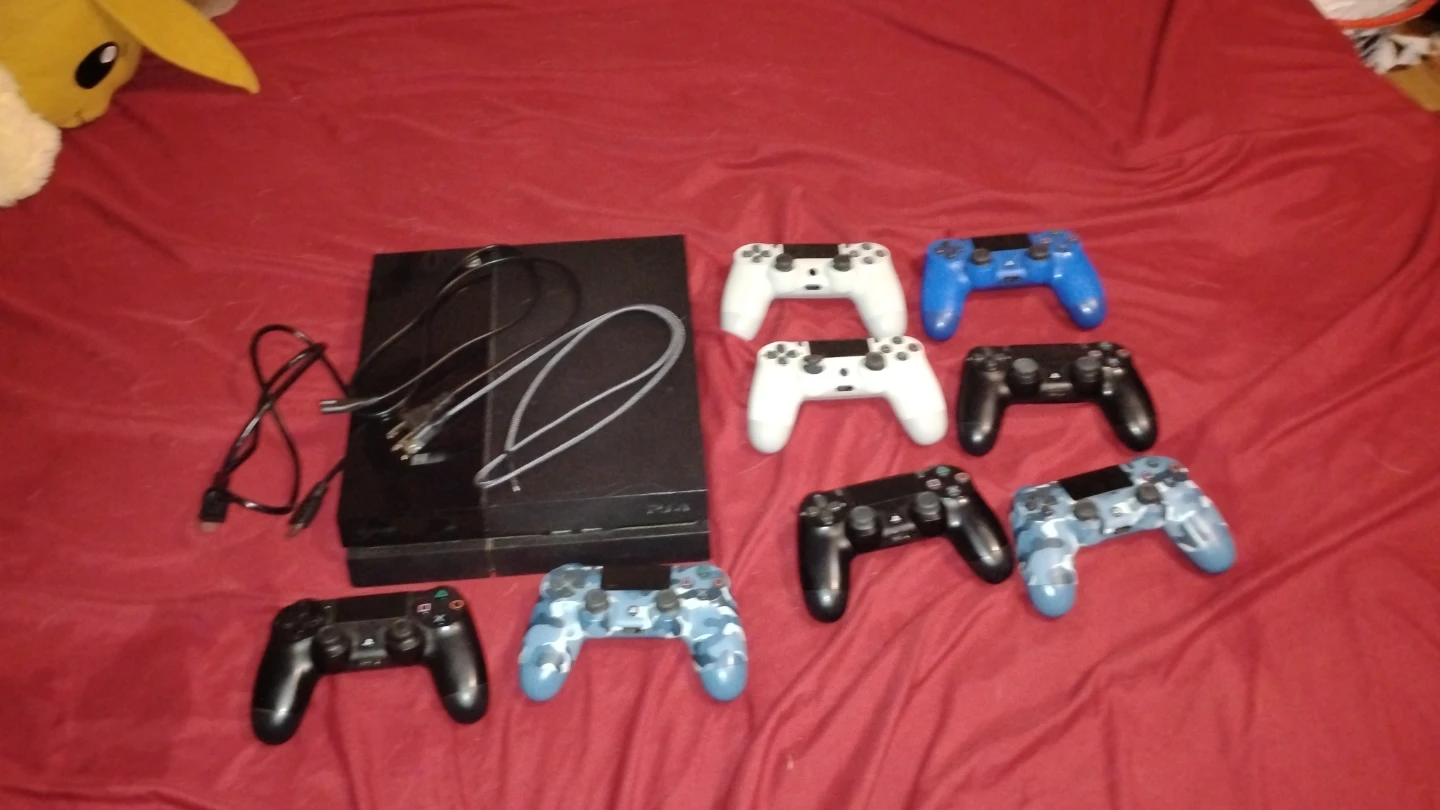 PlayStation 4 Console with 8 Controllers