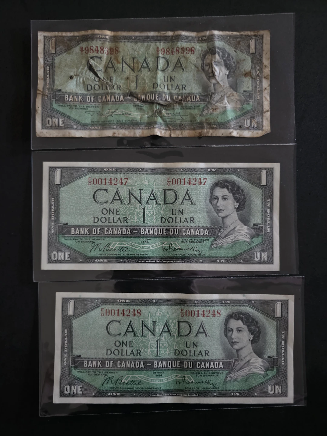 Three 1954 Canadian One Dollar Bank Notes