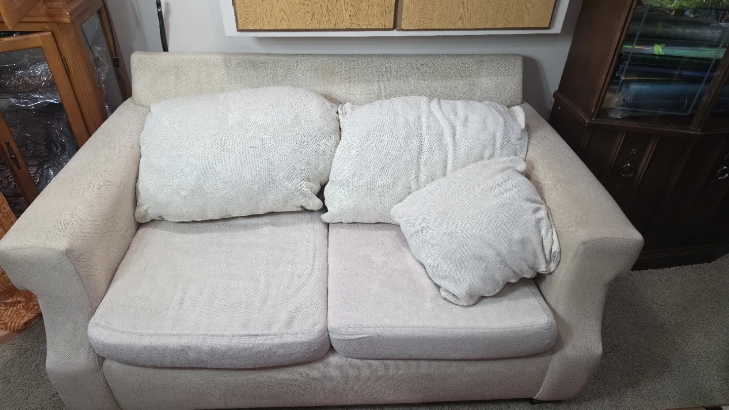 Cream Loveseat with Three Cushions