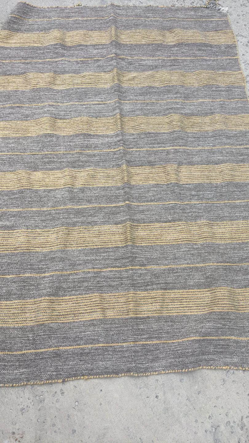 Striped woven area rug