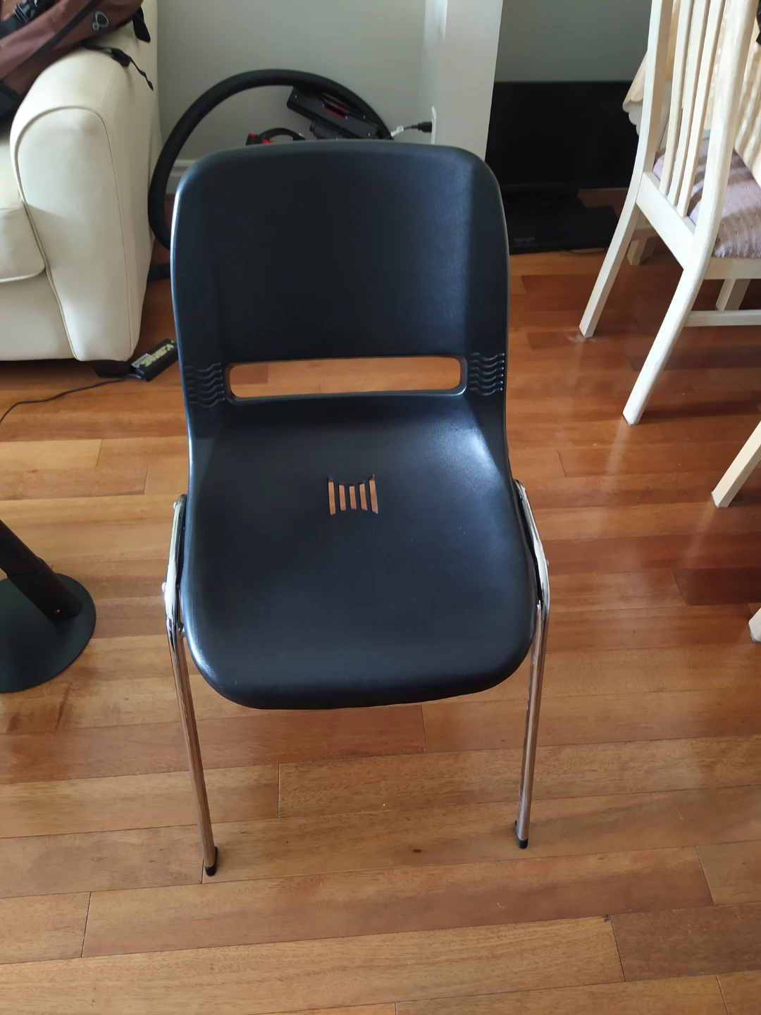 Black plastic stacking chair with chrome legs - photo 4