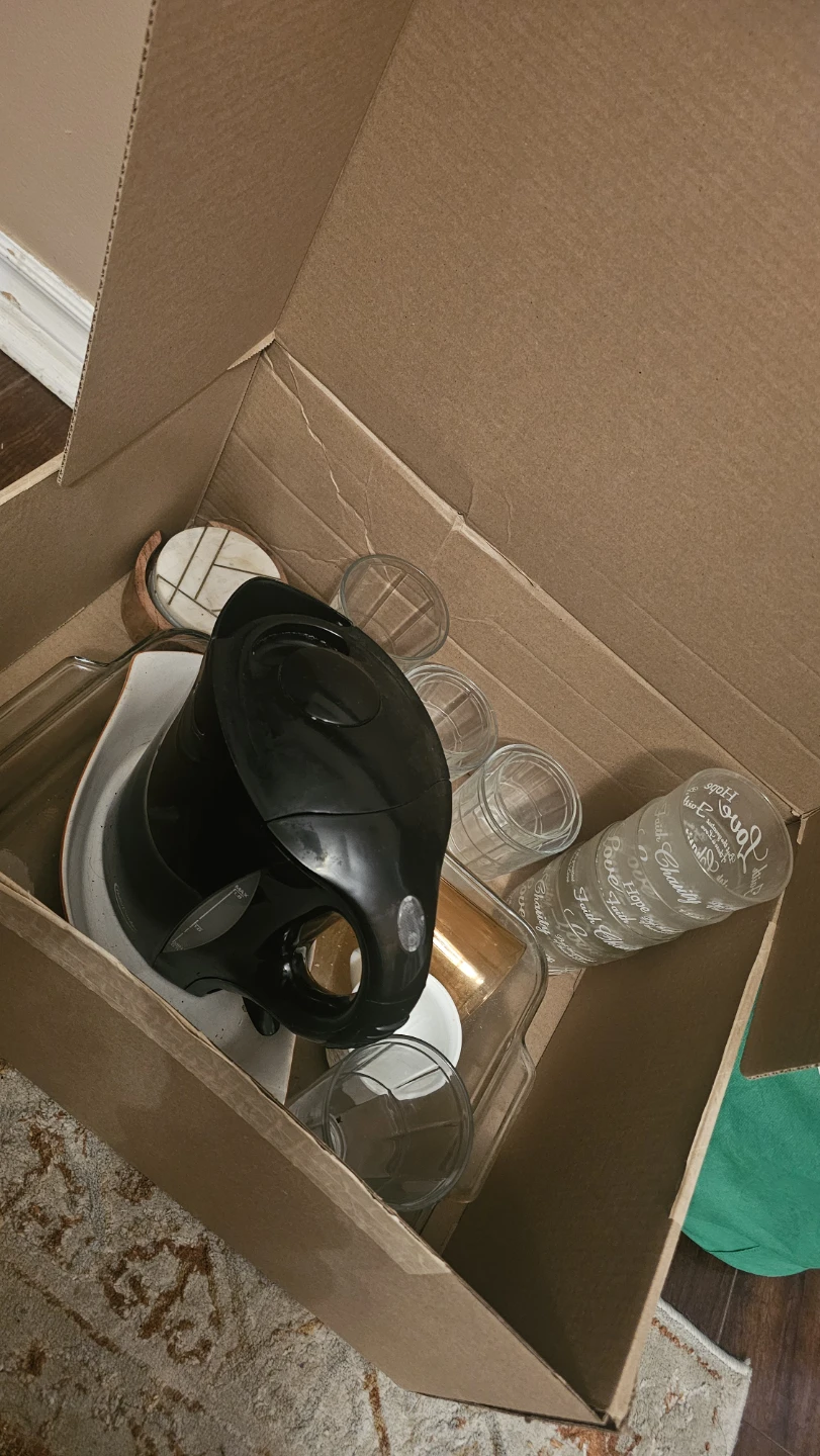 Used glasses, serving bowls, coasters, electric kettle