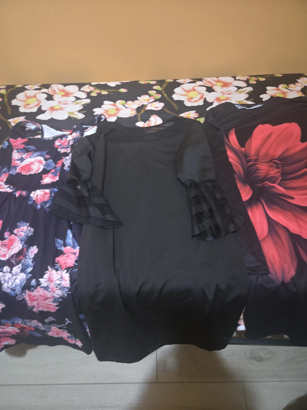 Three assorted women's dresses