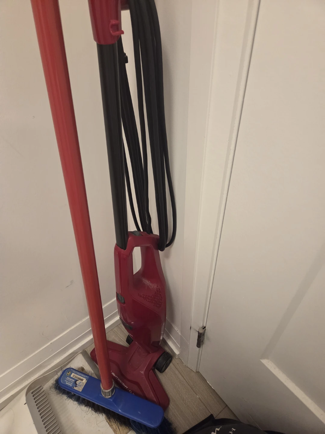 Red lightweight stick vacuum