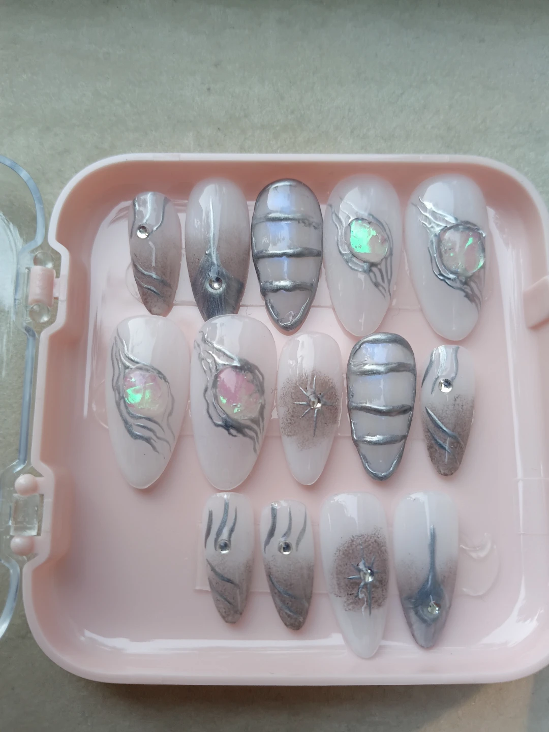 Press-on nail set with silver and gem accents