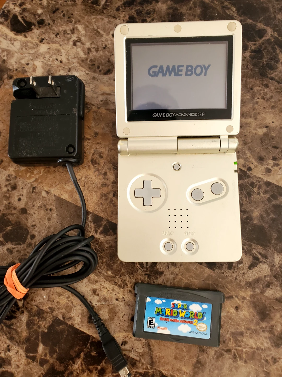 Nintendo Game Boy Advance SP Platinum with Super Mario World