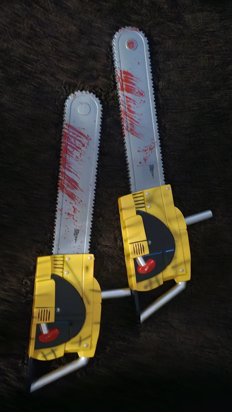 Two Toy Plastic Chainsaws - photo 2