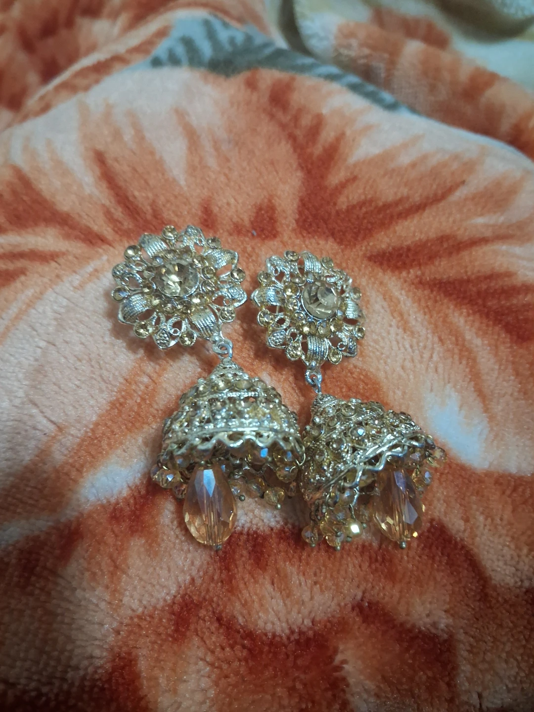 Gold-toned Jhumka Earrings with Crystals