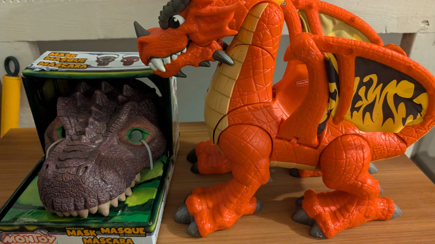 Dinosaur Mask and Fisher-Price Dragon Toy
