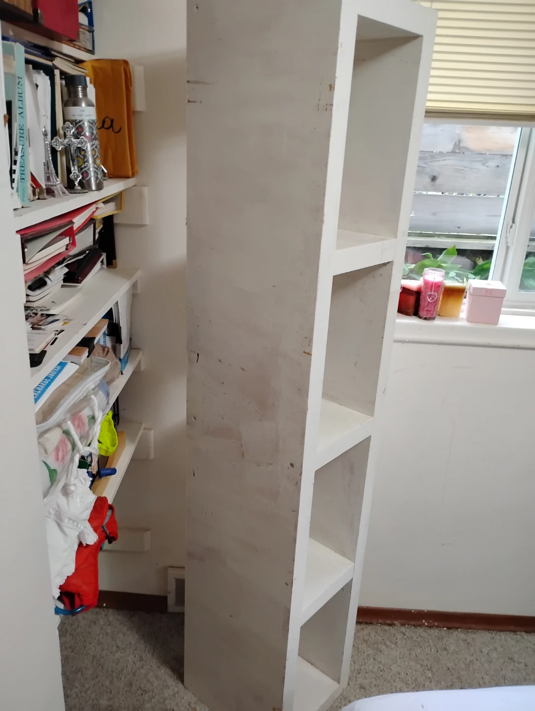 Tall white 4-shelf storage unit