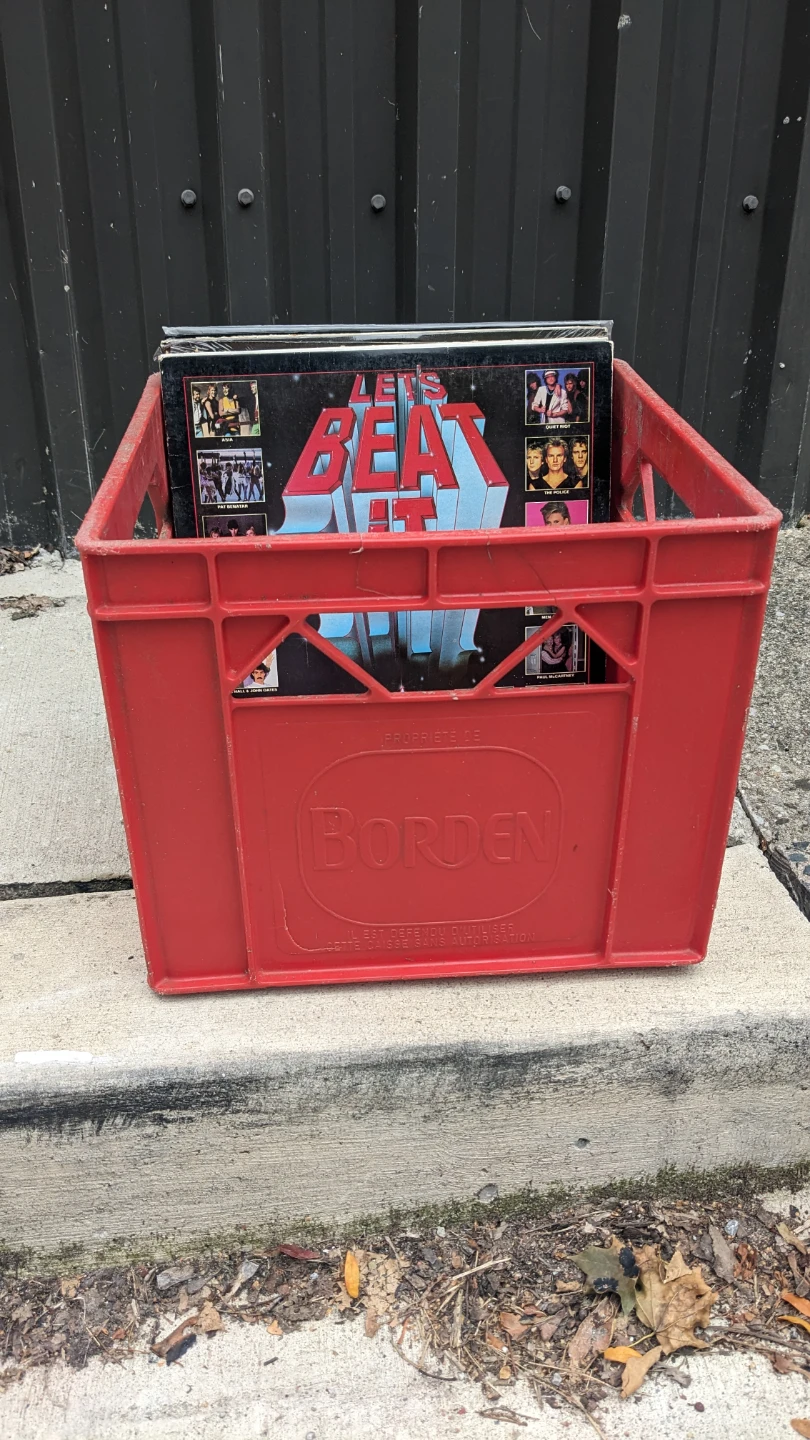 Old crate cracked handle with 12 crappy records
