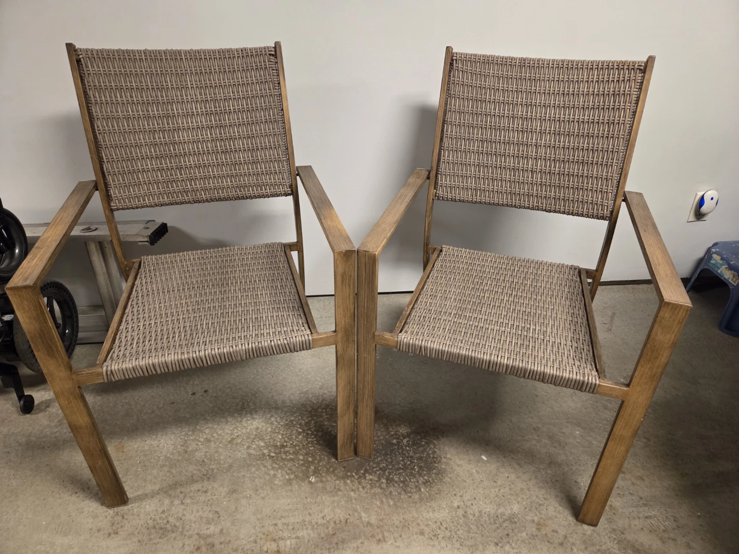 Set of two woven patio armchairs