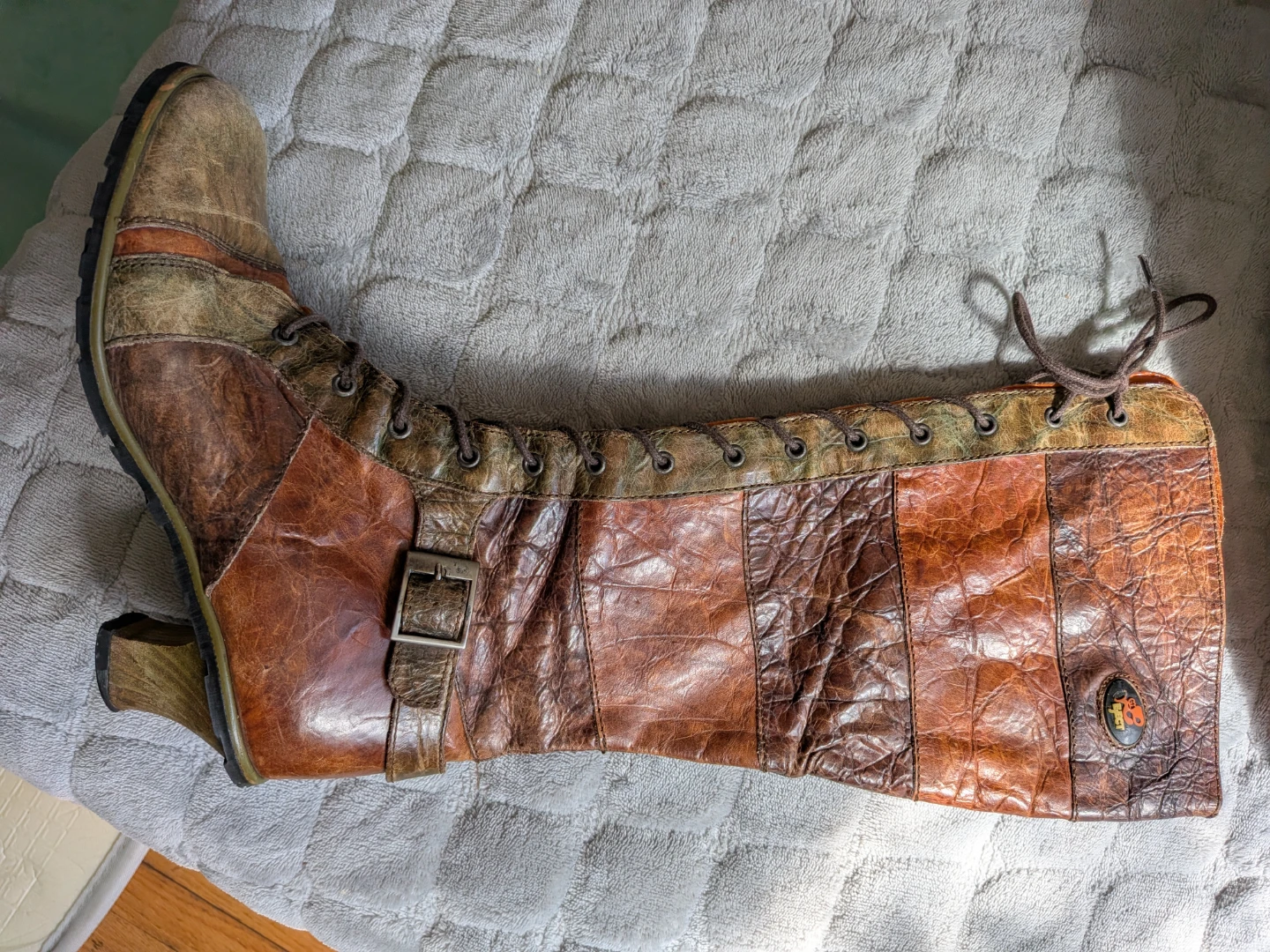 Eject brown leather knee-high boots