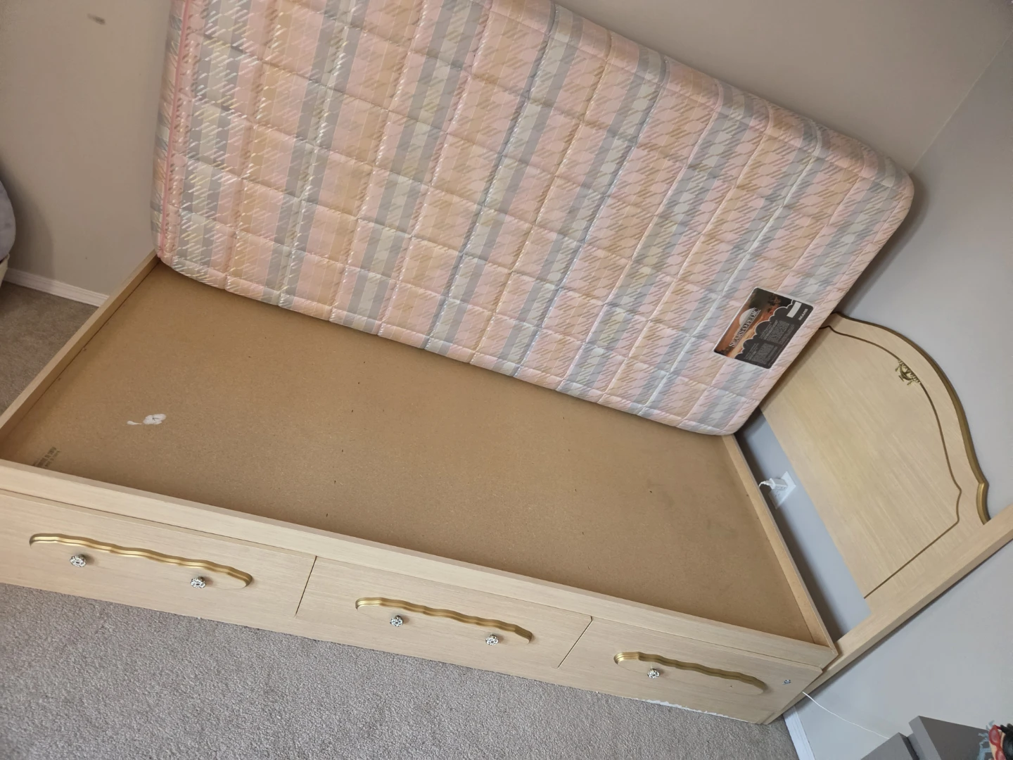 Twin bed with mattress and storage