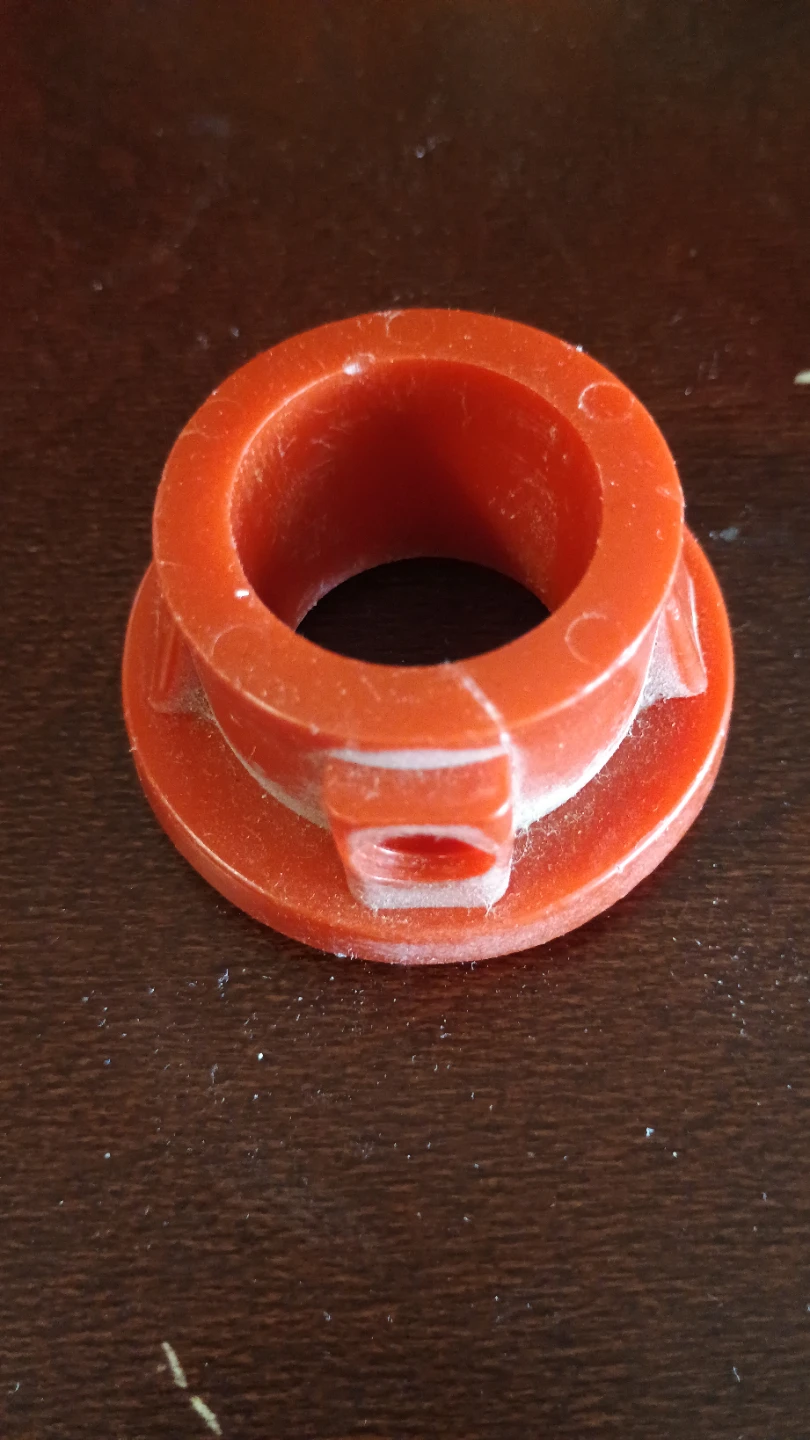 Red Plastic Bushing Component