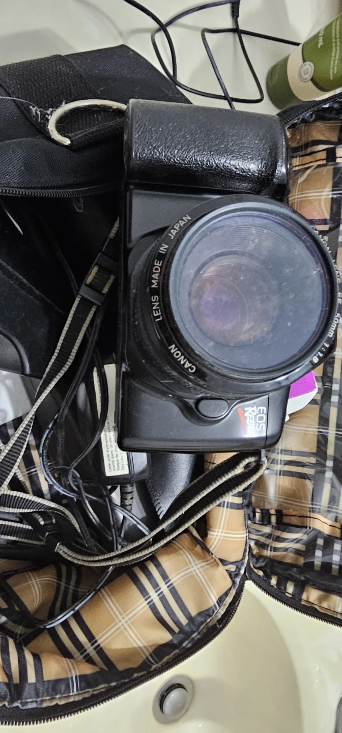 Canon EOS Rebel SLR Camera with Lenses and Flash