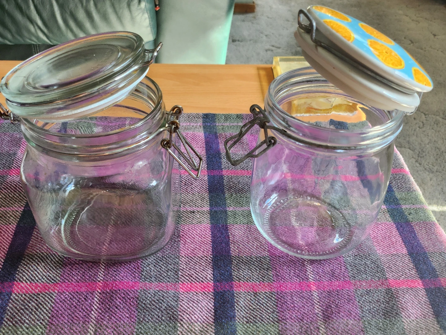 Two Glass Jars Bale Wire Set.