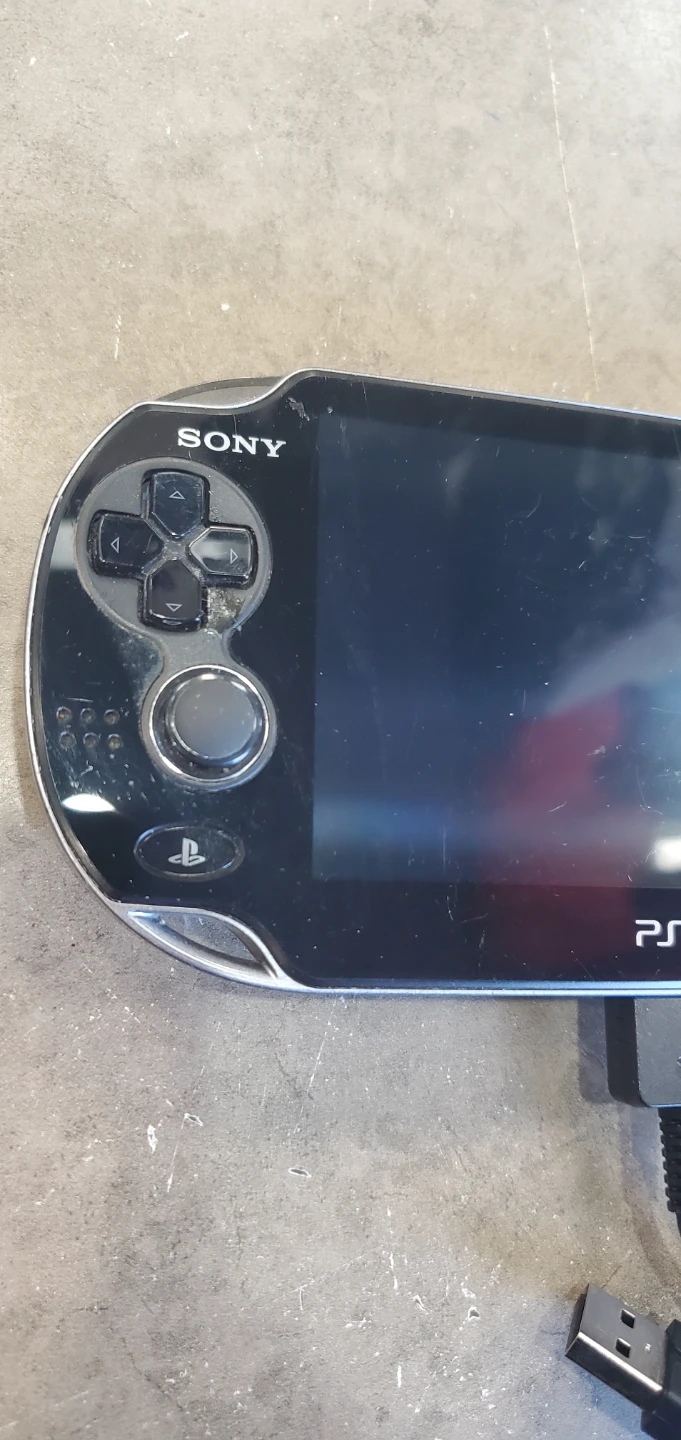 Sony PlayStation Vita 1001 Handheld Console - photo 2