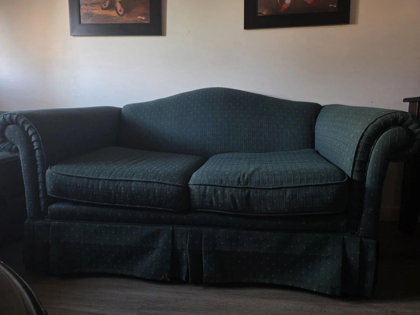 Green patterned loveseat