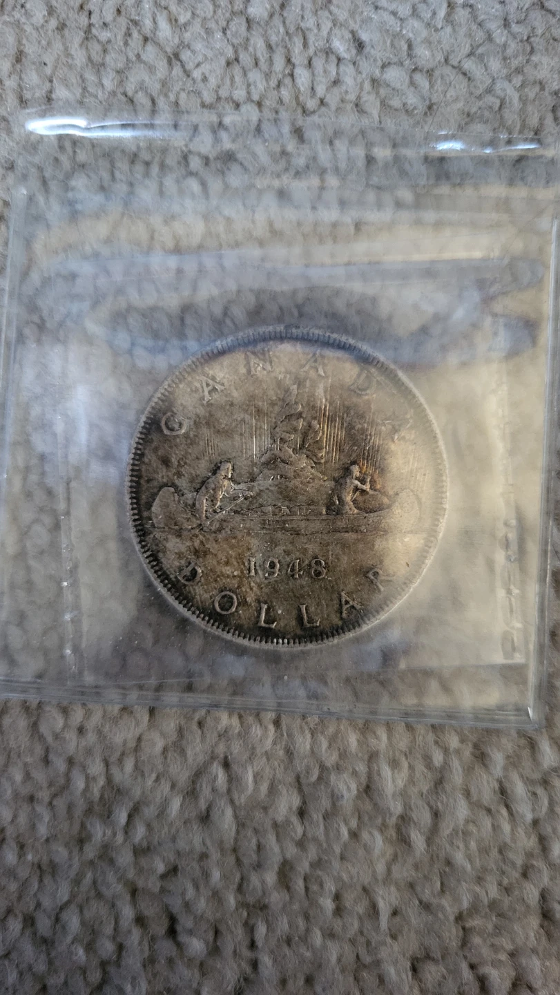 KING OF COINS 1948 Canadian Silver Dollar