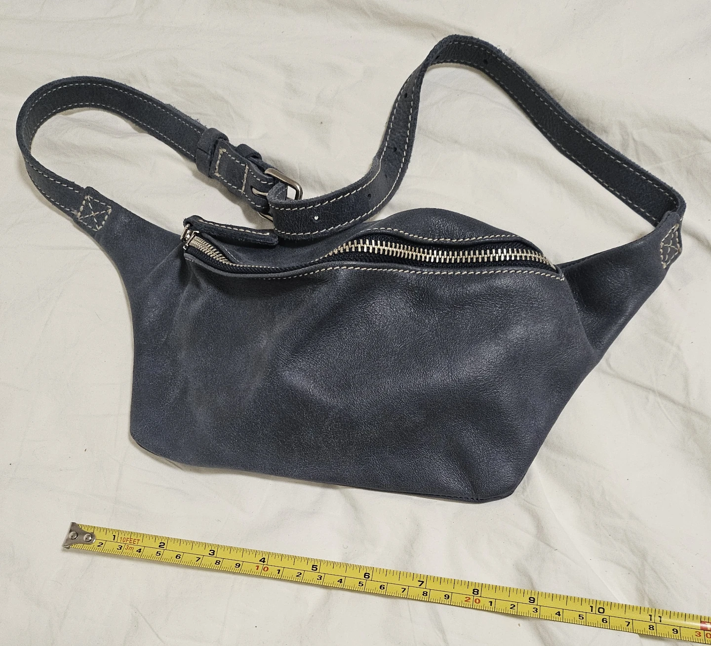 roots genuine leather sling bag