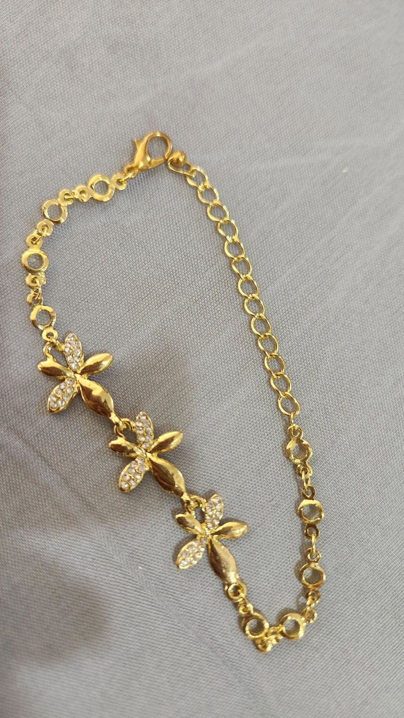 Gold-tone flower charm bracelet with rhinestones - photo 3