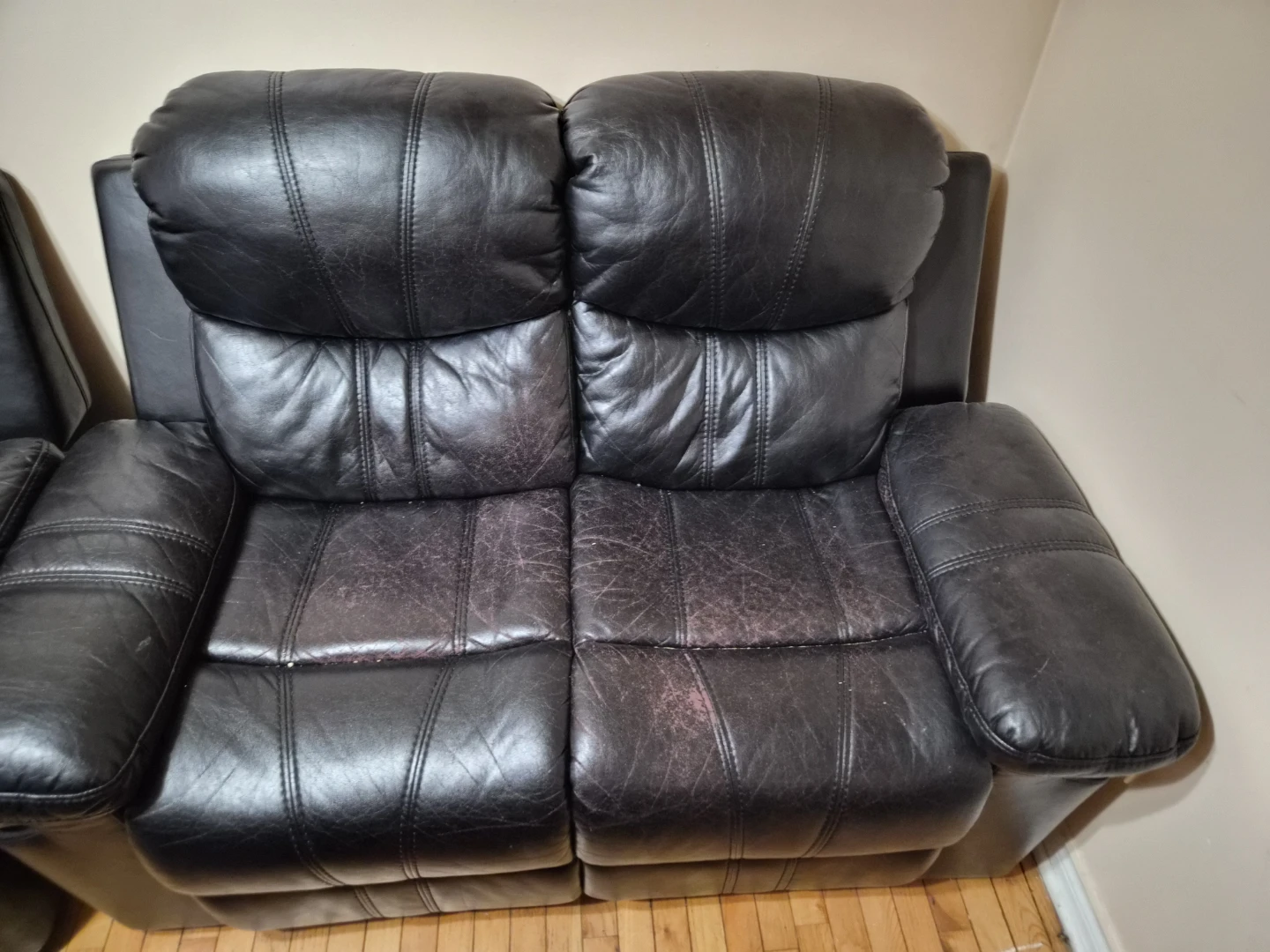 Black Leather Reclining Loveseat