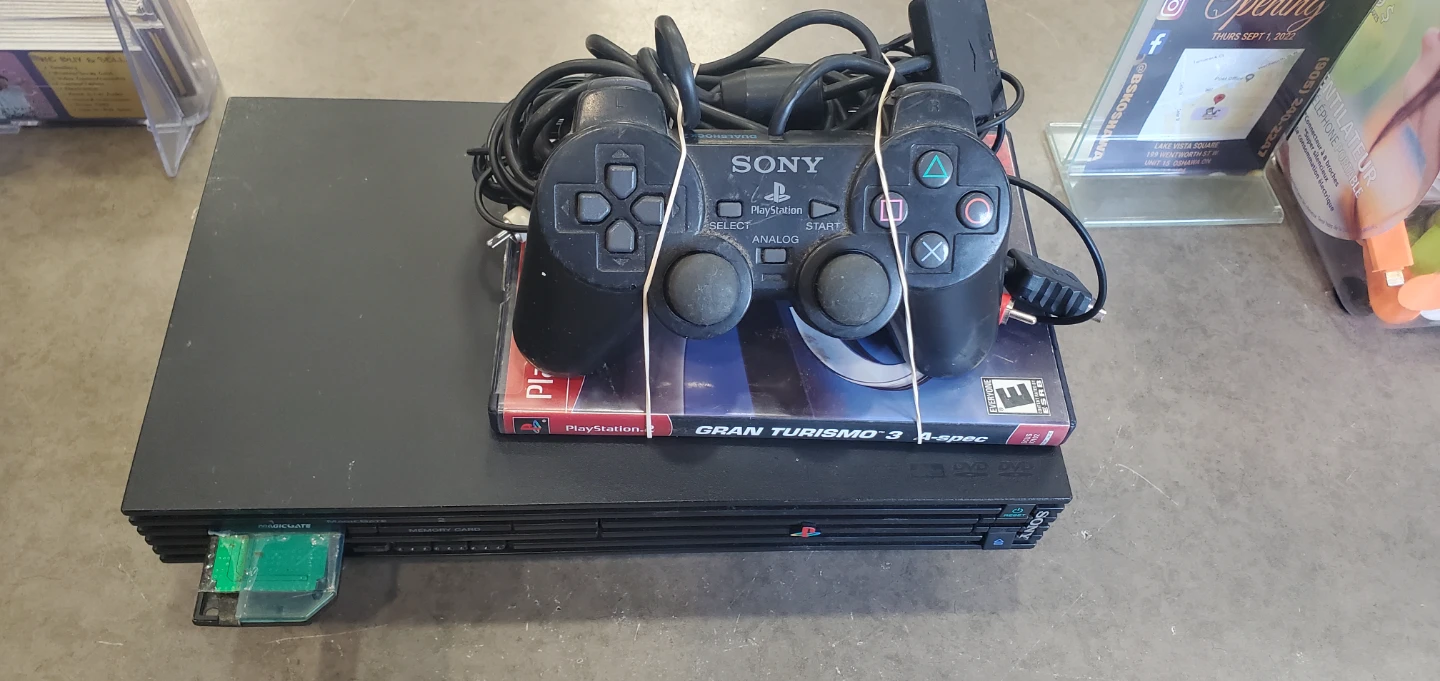 Sony PlayStation 2 Console with Controller and Game
