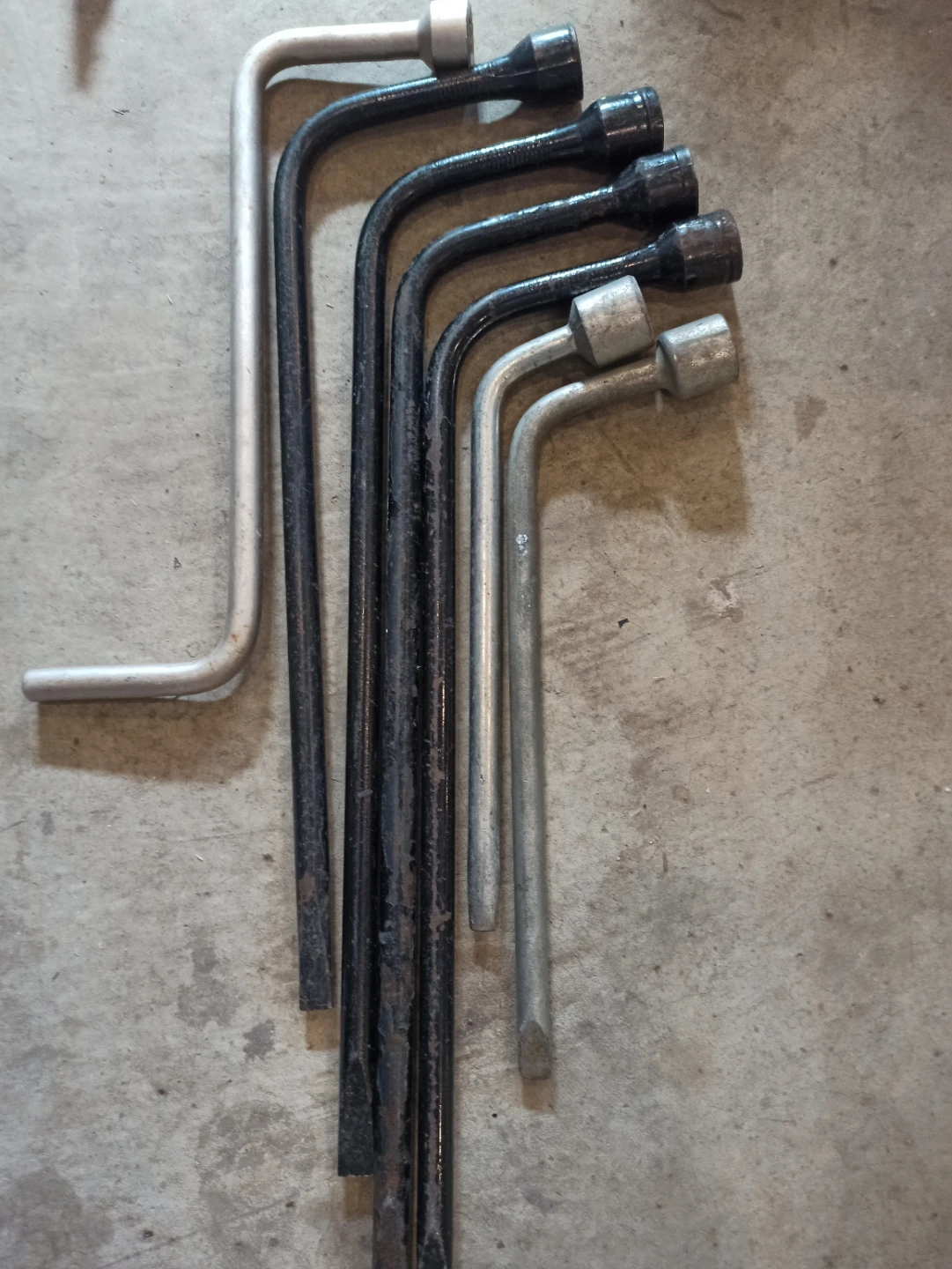 Assorted Automotive Lug Wrenches and Jacks