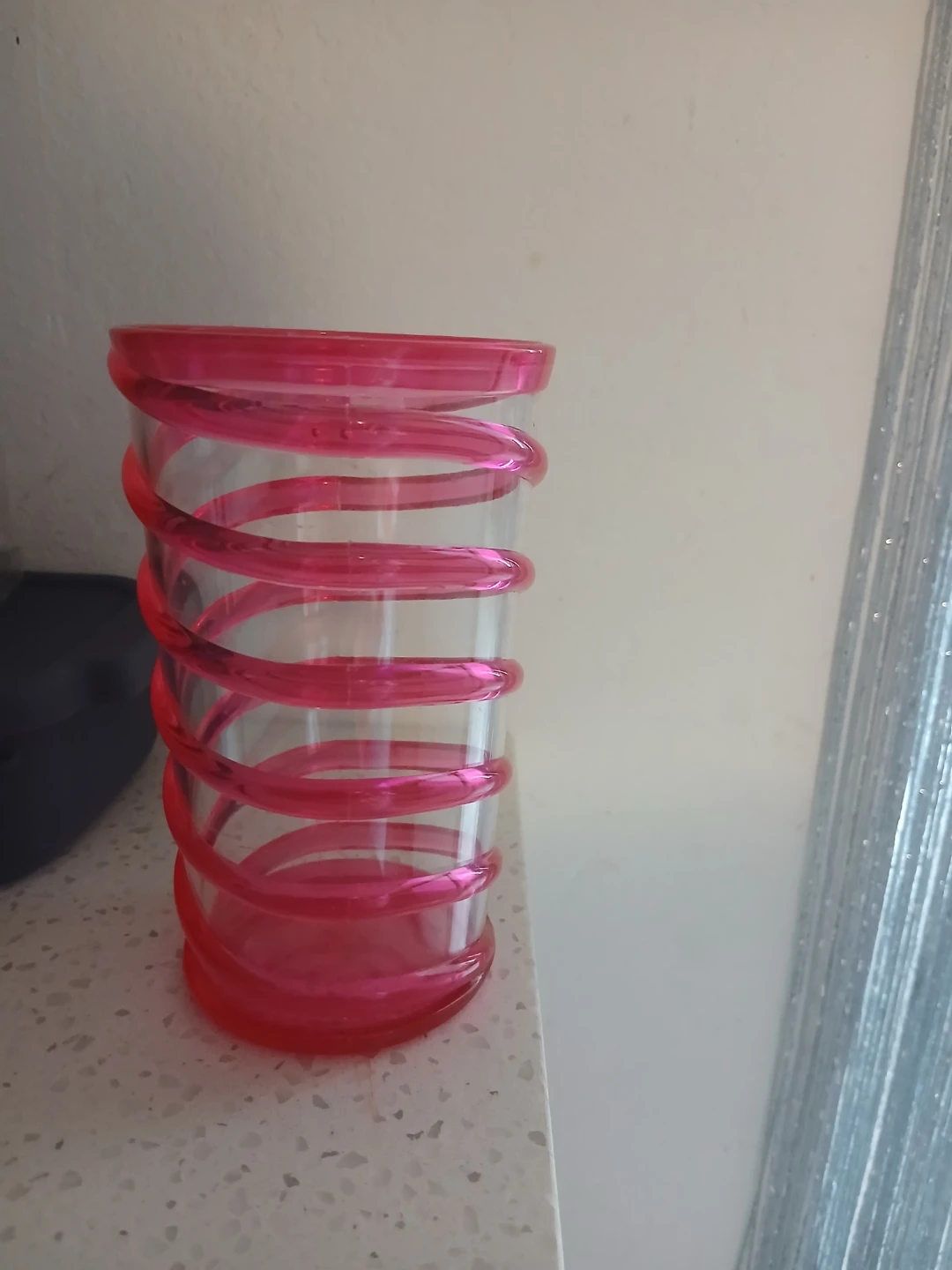 Pink spiral design plastic drinking glass