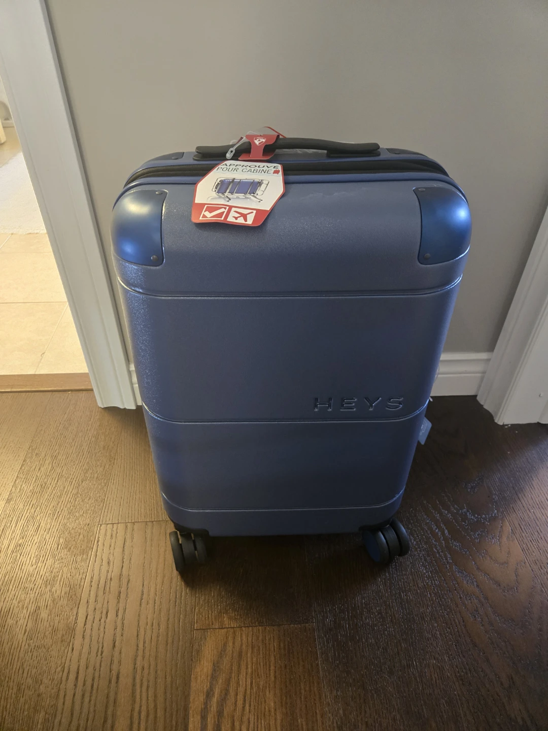 Heys Navy Spinner Carry On Luggage