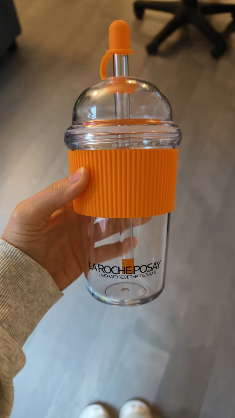 La Roche-Posay branded tumbler with straw