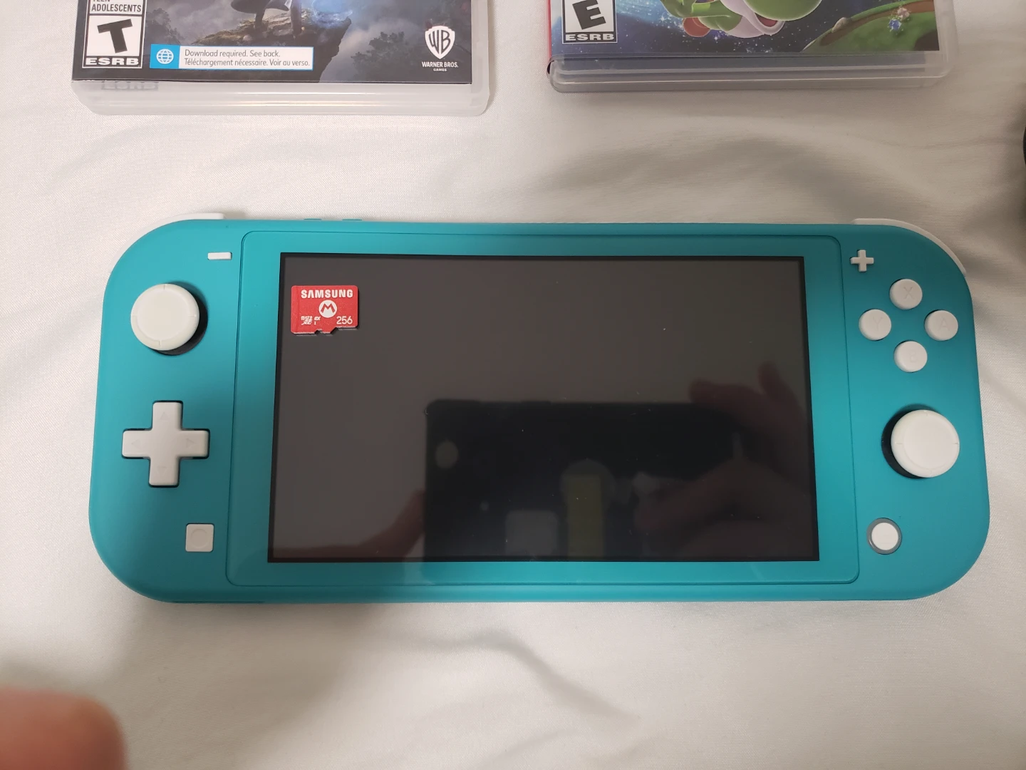 Nintendo Switch Lite + games and 256gb sd card - photo 2