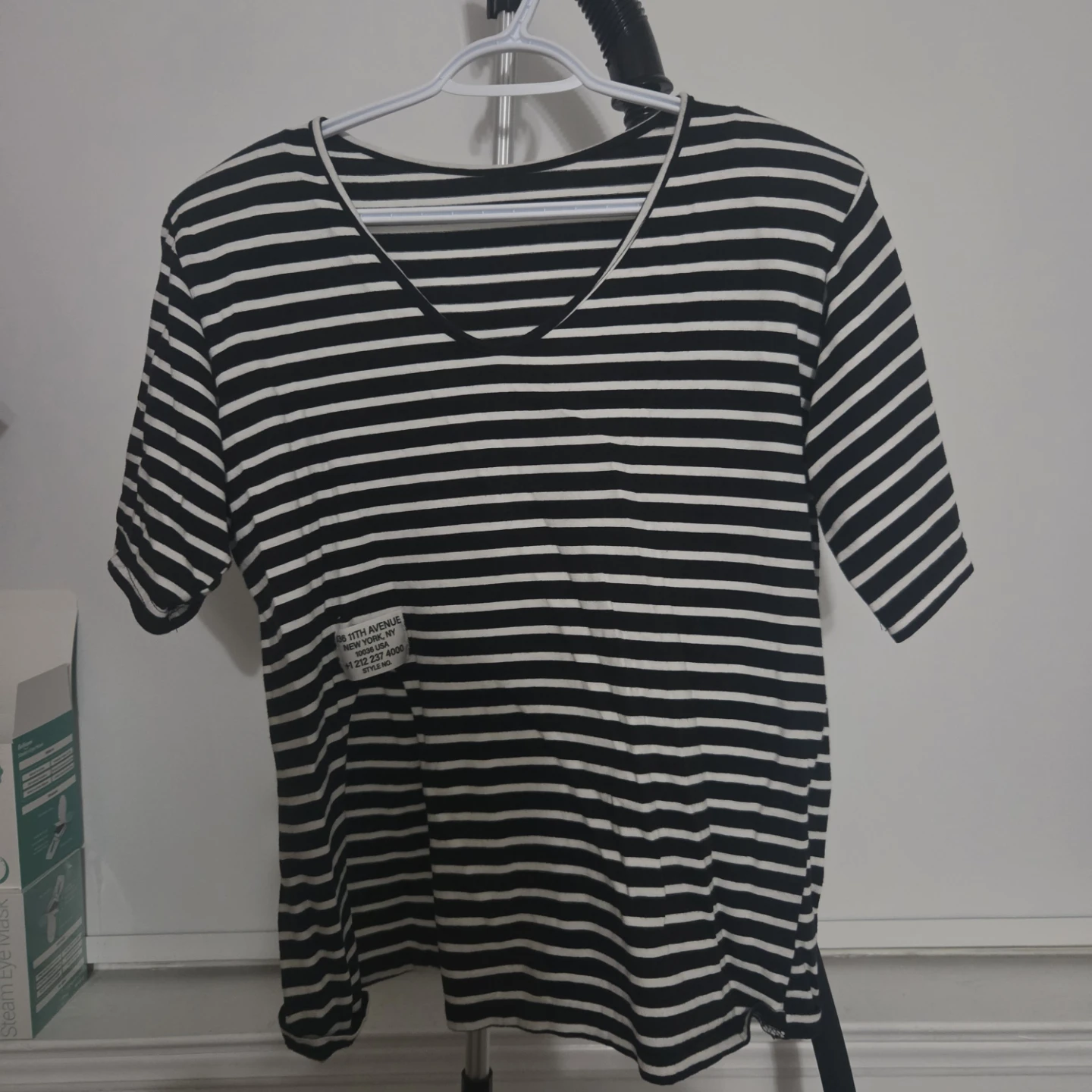 Black and white striped V-neck t-shirt