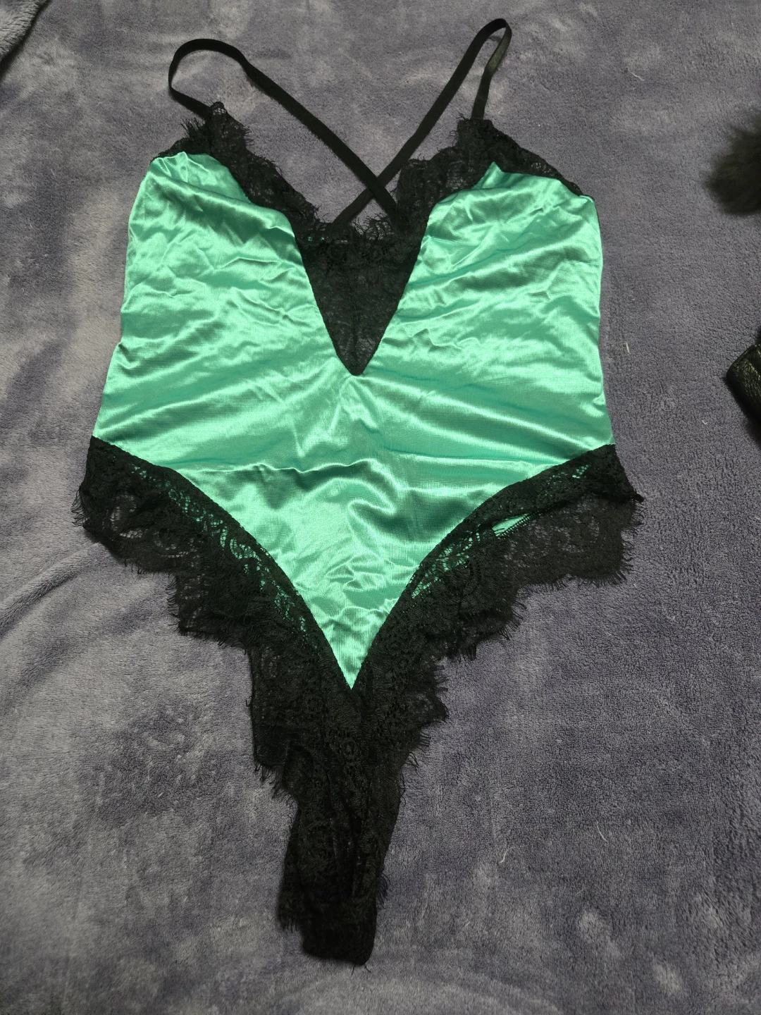 Green and black bodysuit