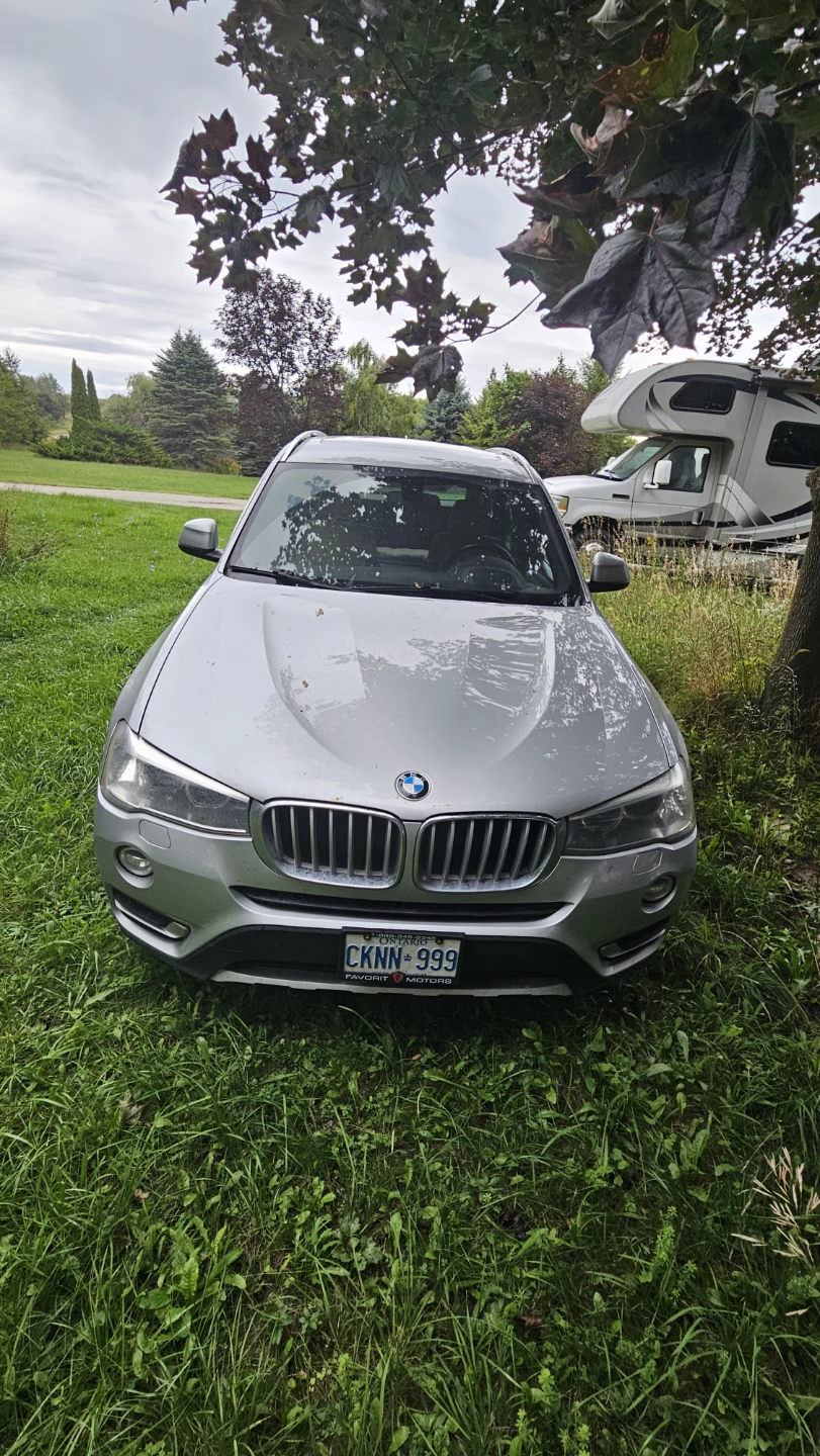 Silver BMW X3 SUV - photo 2