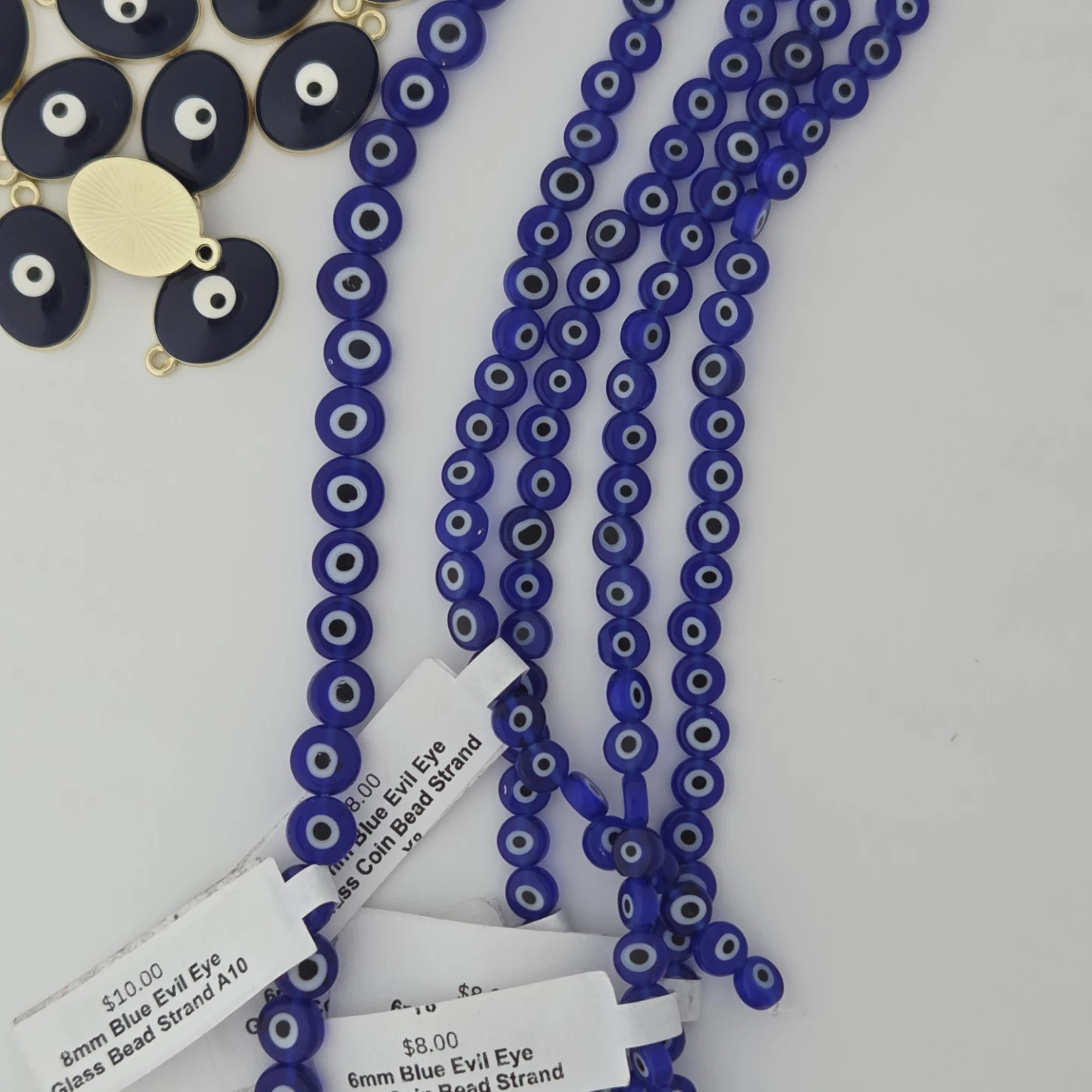 Assorted Evil Eye Charms and Beads - photo 3