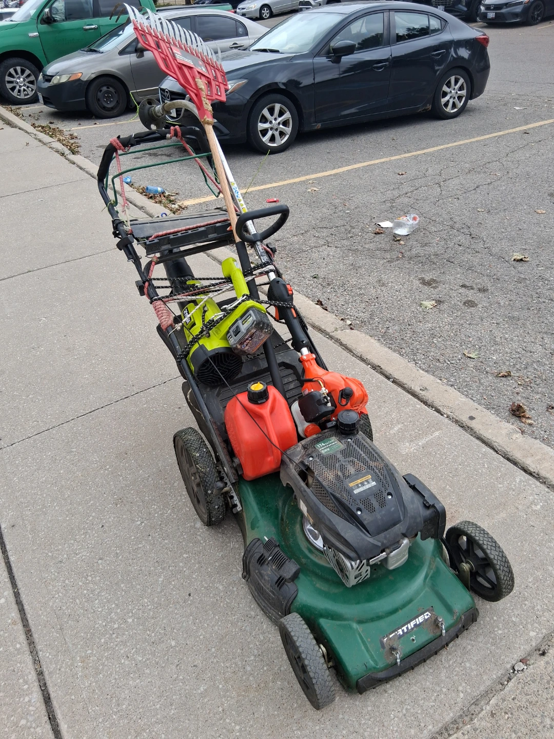 Certified lawn mower with yard tools