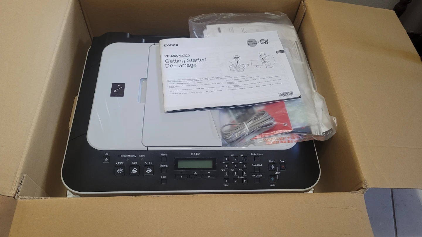 Canon PIXMA MX320 printer, fax photocopy/scanner