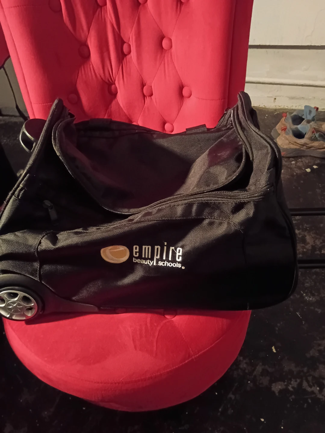 Empire Beauty Schools rolling duffel bag