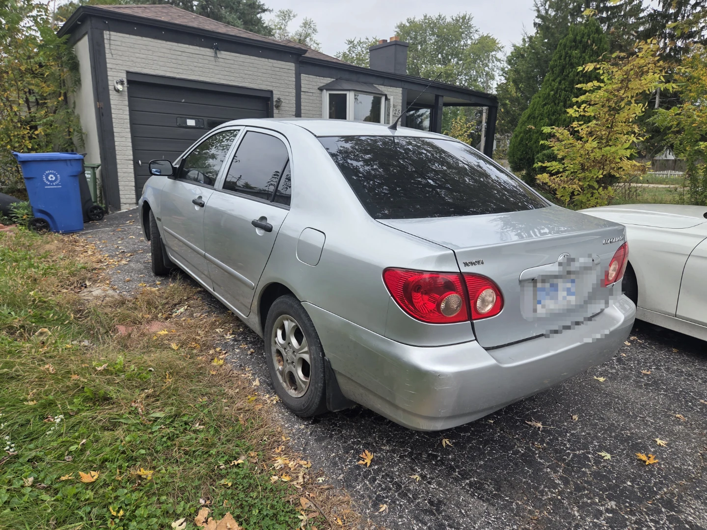 Silver Toyota Corolla CE Sedan
