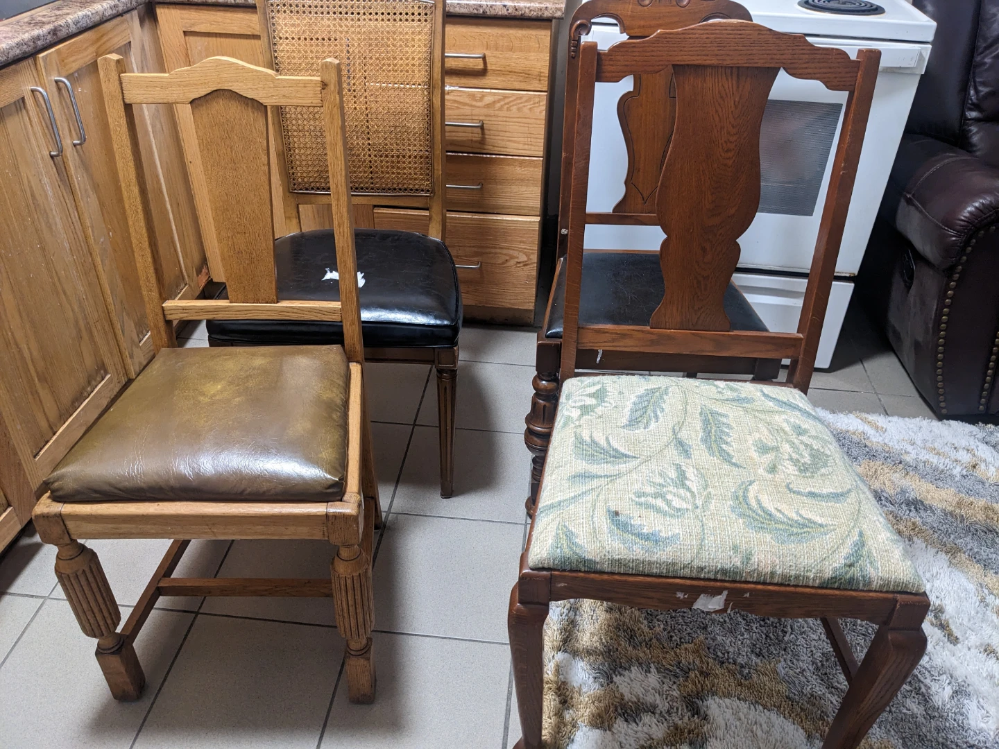 Set of four mismatched dining chairs