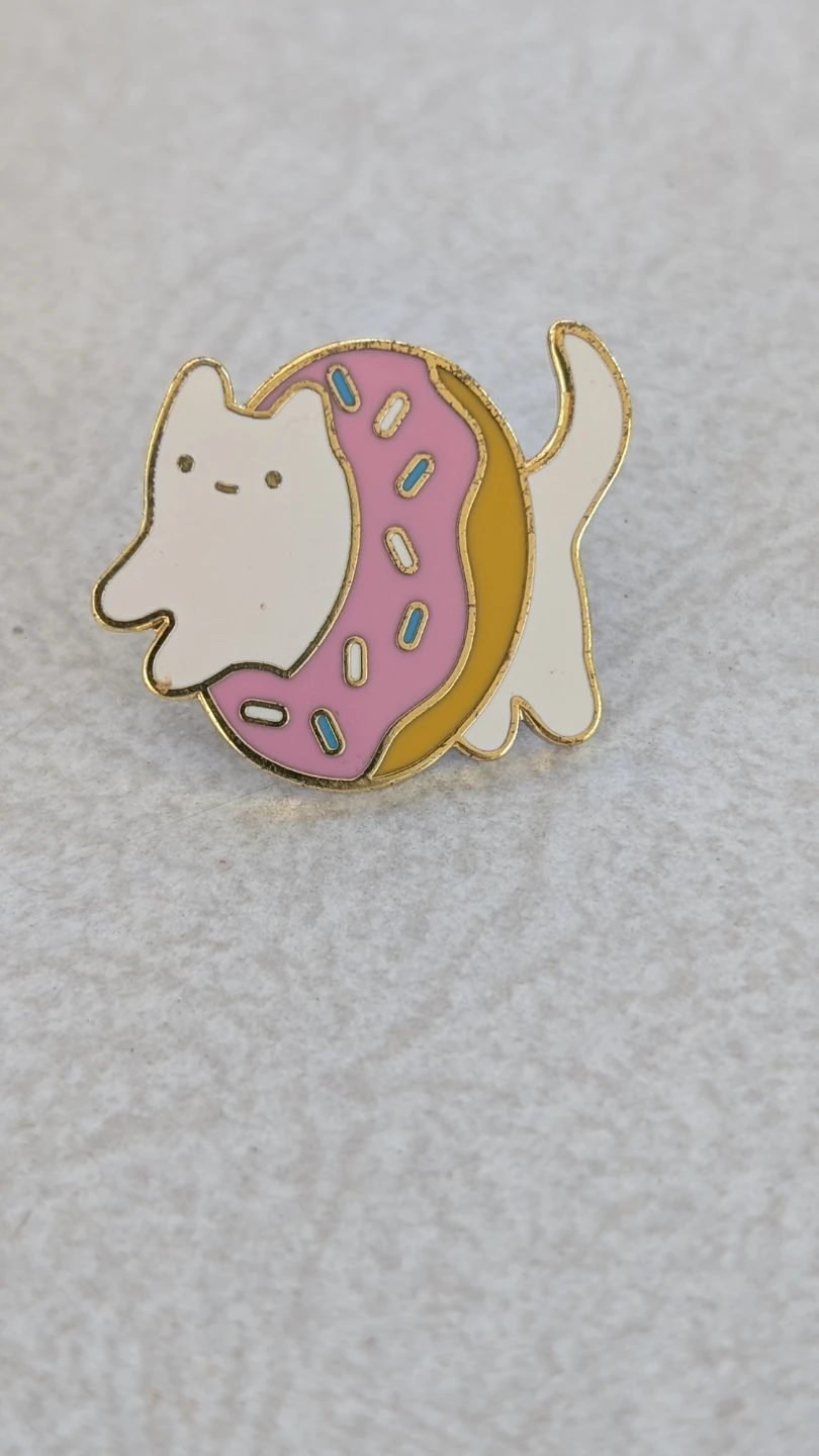 Sparkle Collective donut cat enamel pin