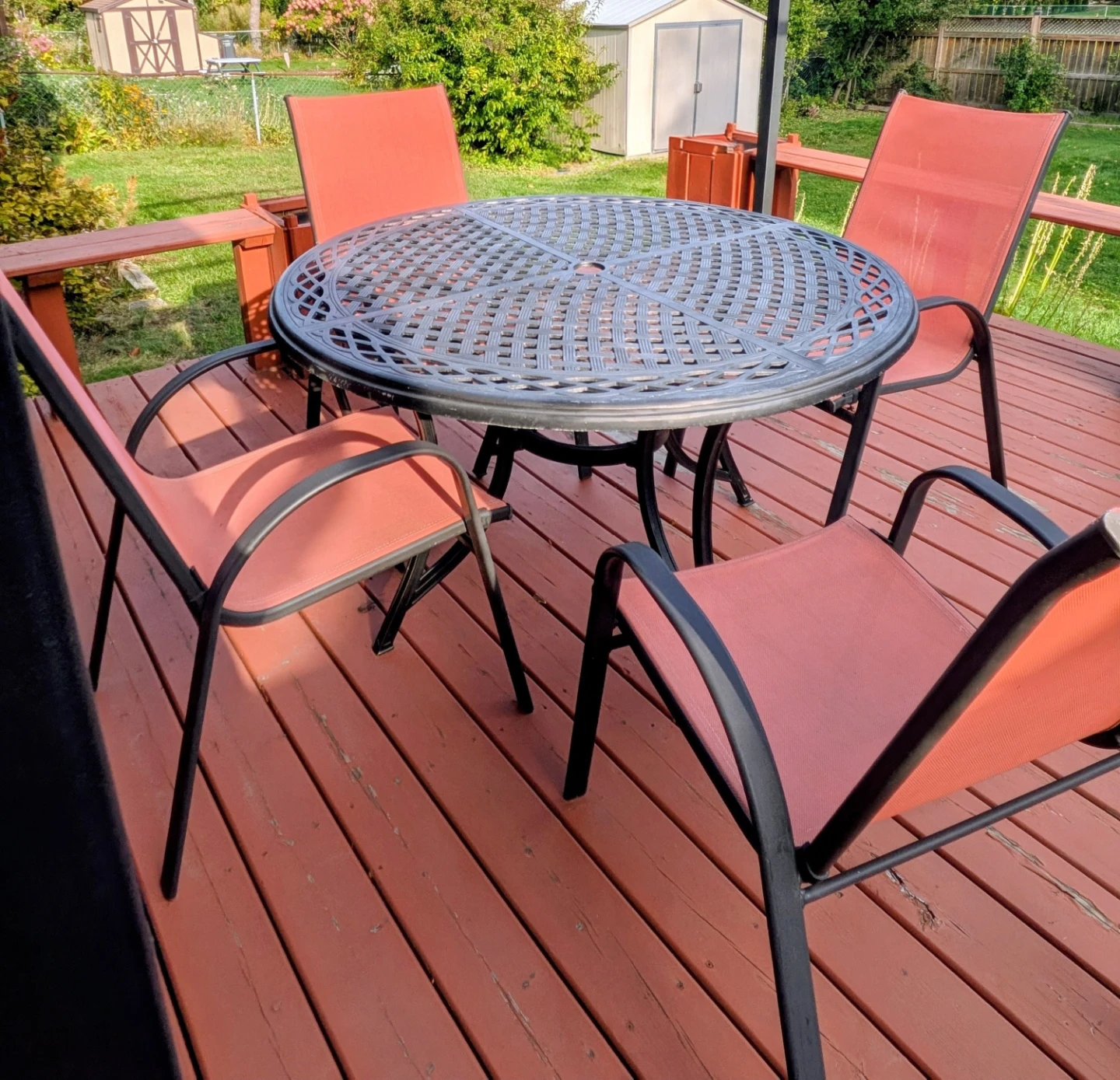 48" Cast aluminum table + chairs